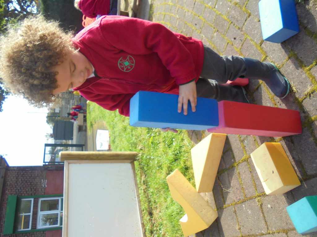 outside with building blocks